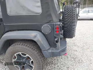 2015 Jeep Wrangler Unlimited Rubicon Hard Rock with VIN 1C4HJWFG6FL757421, listed as a IAAI auction lot 42107514 with 63,997 mi miles and . Bid and sale history available at DreamBid. Image 18.