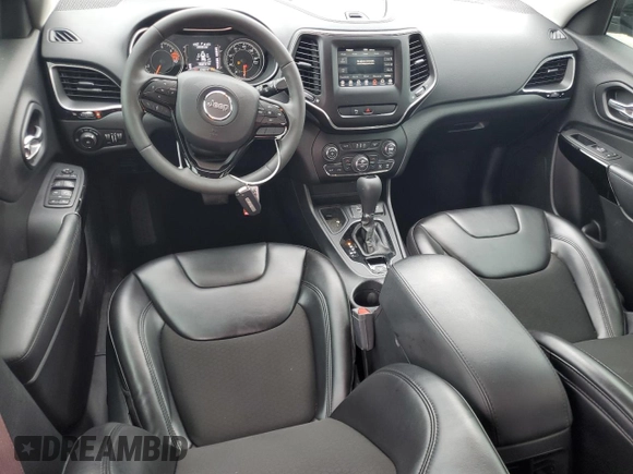 2020 Jeep Cherokee Altitude with VIN 1C4PJLLB4LD592817, listed as a Copart auction lot 58168785 with 57,400 mi miles and Salvage title. Bid and sale history available at DreamBid. Image 8.
