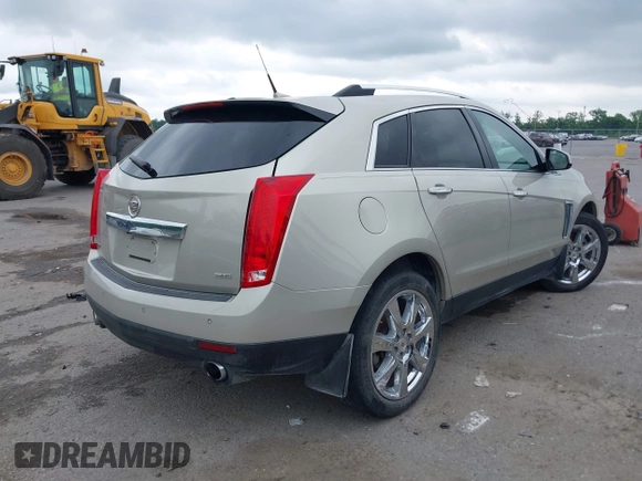 2014 Cadillac SRX Performance Collection z VIN 3GYFNCE35ES610504, wystawiony jako IAAI lot #42133548 z przebiegiem 140 306 mil mil oraz . Historia ofert i sprzedaży dostępna na DreamBid. Obrazek 4.