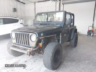 1999 Jeep Wrangler Sport with VIN 1J4FY19S4XP494405, listed as a IAAI auction lot 42542416 with 168,856 mi miles and . Bid and sale history available at DreamBid. Image 17.
