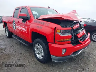 2018 Chevrolet Silverado 1500 LT with VIN 1GCVKREC1JZ370801, listed as a IAAI auction lot 41794974 with 74,510 mi miles and . Bid and sale history available at DreamBid. Image 1.