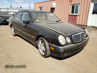1999 Mercedes-Benz E-Class with VIN WDBJF70H6XA758770, listed as a Copart auction lot 70312094 with 0 mi miles and Salvage Title. Bid and sale history available at carsss.com. Image 4.