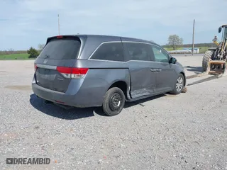 2016 Honda Odyssey SE with VIN 5FNRL5H3XGB043251, listed as a IAAI auction lot 42050805 with 156,537 mi miles. Bid and sale history available at carsss.com. Image 4.