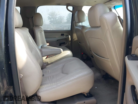 2003 Chevrolet Suburban LT z VIN 1GNEC16Z13J216552, wystawiony jako IAAI lot #40193670 z przebiegiem 235 840 mil mil oraz . Historia ofert i sprzedaży dostępna na DreamBid. Obrazek 8.