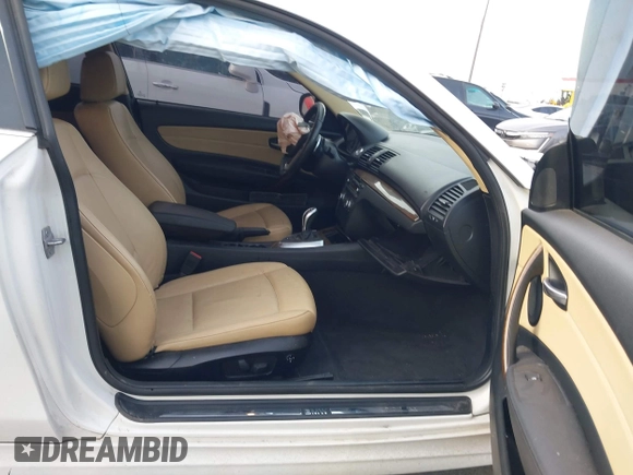 2013 BMW 1 Series 135i with VIN WBAUC9C52DVM13628, listed as a IAAI auction lot 41901475 with 113,598 mi miles and . Bid and sale history available at DreamBid. Image 5.