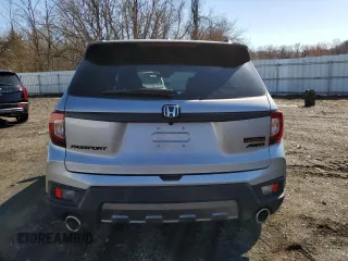 2022 Honda Passport TrailSport z VIN 5FNYF8H61NB026883, wystawiony jako Copart lot #49298085 z przebiegiem 18 600 mil mil oraz Szkoda całkowita • Salvage title. Historia ofert i sprzedaży dostępna na DreamBid. Obrazek 6.