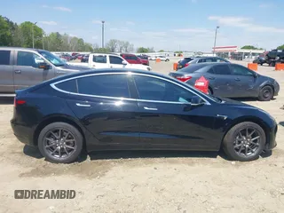 2018 Tesla Model 3 Long Range Battery with VIN 5YJ3E1EB1JF122786, listed as a IAAI auction lot 42010451 with 85,510 mi miles and . Bid and sale history available at DreamBid. Image 13.