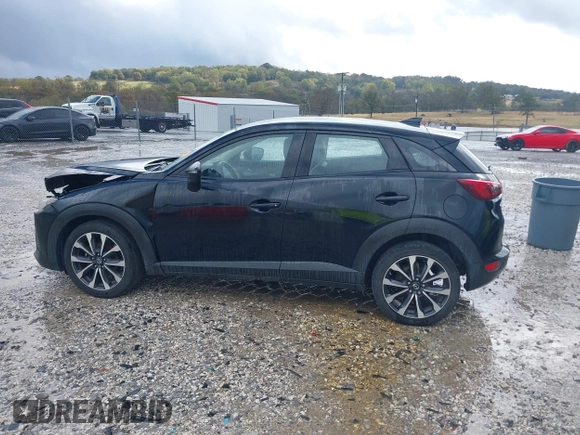 2019 Mazda CX-3 Touring with VIN JM1DKDC76K1406860, listed as a IAAI auction lot 40767122 with 162,636 mi miles. Bid and sale history available at carsss.com. Image 14.
