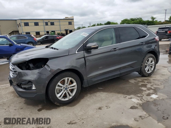 2019 Ford Edge SEL z VIN 2FMPK4J92KBB21770, wystawiony jako Copart lot #56056585 z przebiegiem 64 042 mil mil oraz Szkoda całkowita • Salvage title. Historia ofert i sprzedaży dostępna na DreamBid. Obrazek 1.