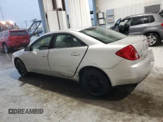 2006 Pontiac G6 with VIN 1G2ZF55B664225896, listed as a Copart auction lot 50985215 with 115,026 mi miles and Salvage title. Bid and sale history available at DreamBid. Image 2.