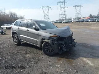 2016 Jeep Grand Cherokee Laredo z VIN 1C4RJFAGXGC471150, wystawiony jako IAAI lot #41493788 z przebiegiem 93 993 mil mil oraz . Historia ofert i sprzedaży dostępna na DreamBid. Obrazek 1.