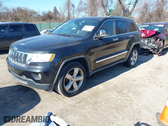 2011 Jeep Grand Cherokee Overland with VIN 1J4RS6GGXBC659349, listed as a IAAI auction lot 41778399 with 219,624 mi miles and . Bid and sale history available at DreamBid. Image 19.
