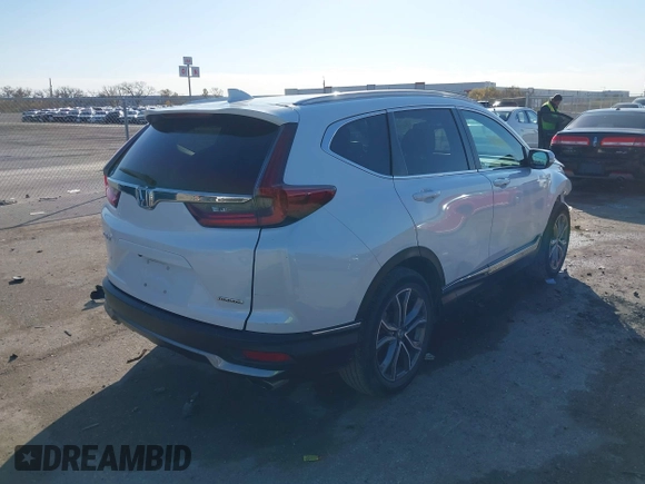 2021 Honda CR-V Touring with VIN 2HKRW1H9XMH402745, listed as a IAAI auction lot 41059541 with 24,282 mi miles. Bid and sale history available at carsss.com. Image 4.