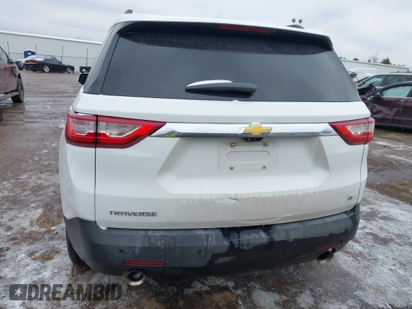 2021 Chevrolet Traverse LT with VIN 1GNERHKWXMJ218191, listed as a IAAI auction lot 41512332 with 87,206 mi miles and . Bid and sale history available at DreamBid. Image 16.