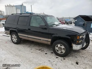 1996 Chevrolet Tahoe with VIN 1GNEK13R9TJ335411, listed as a Copart auction lot 87663725 with 111,802 mi miles and Salvage Title. Bid and sale history available at carsss.com. Image 4.