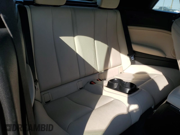 2016 BMW 2 Series 228i xDrive with VIN WBA1L9C54GV325722, listed as a Copart auction lot 71993534 with 117,467 mi miles and Salvage Title. Bid and sale history available at carsss.com. Image 11.