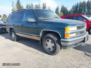 1998 Chevrolet Tahoe with VIN 1GNEK13R9WJ365044, listed as a IAAI auction lot 42042506 with 187,987 mi miles. Bid and sale history available at carsss.com. Image 1.