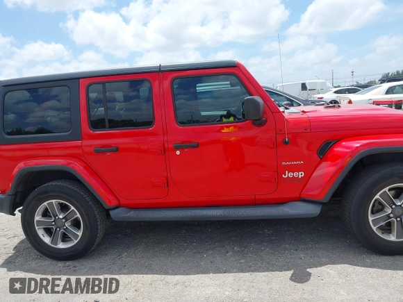 2019 Jeep Wrangler Unlimited Sahara with VIN 1C4HJXEG4KW573157, listed as a IAAI auction lot 42118373 with 105,890 mi miles and . Bid and sale history available at DreamBid. Image 13.
