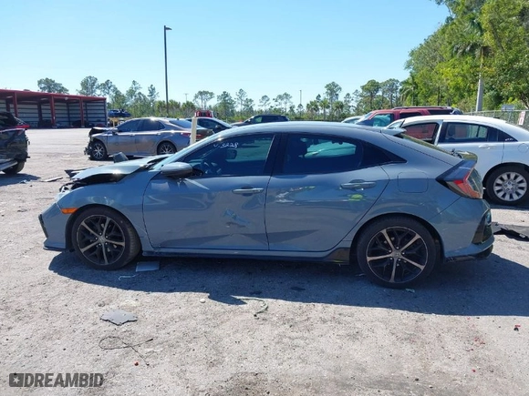 2021 Honda Civic Hatchback Sport with VIN SHHFK7H45MU213228, listed as a IAAI auction lot 41780240 with 58,998 mi miles. Bid and sale history available at carsss.com. Image 14.