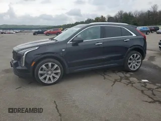 2021 Cadillac XT4 AWD Luxury with VIN 1GYFZBR4XMF014647, listed as a Copart auction lot 63800444 with 49,724 mi miles and Salvage Title. Bid and sale history available at carsss.com. Image 1.