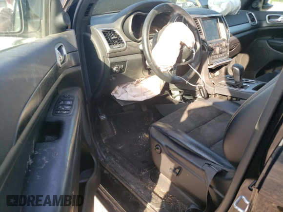 2018 Jeep Grand Cherokee Laredo E with VIN 1C4RJFAG5JC487487, listed as a Copart auction lot 61838185 with 54,297 mi miles and Salvage title. Bid and sale history available at DreamBid. Image 8.
