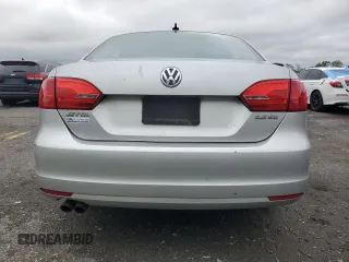 2011 Volkswagen Jetta SE with VIN 3VWDZ7AJ9BM320146, listed as a Copart auction lot 58521605 with 164,045 mi miles and Salvage title. Bid and sale history available at DreamBid. Image 6.