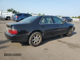 2002 Cadillac Seville Touring STS z VIN 1G6KY54922U210928, wystawiony jako Copart lot #71214564 z przebiegiem Nie podano mil oraz Tytuł czysty. Historia ofert i sprzedaży dostępna na DreamBid. Obrazek 3.