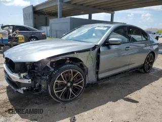 2023 BMW 5 Series 530i with VIN WBA53BH02PCM55841, listed as a Copart auction lot 58391765 with 6,947 mi miles and Salvage title. Bid and sale history available at DreamBid. Image 1.