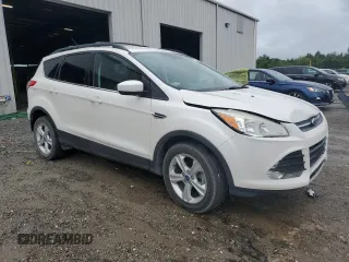 2013 Ford Escape SE with VIN 1FMCU0GX3DUB86597, listed as a Copart auction lot 59513935 with 94,293 mi miles and Salvage title. Bid and sale history available at DreamBid. Image 4.
