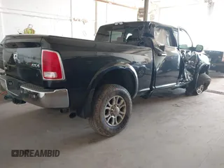 2017 Ram 2500 Laramie with VIN 3C6UR5FL8HG671078, listed as a IAAI auction lot 42233014 with 295,572 mi miles and . Bid and sale history available at DreamBid. Image 4.