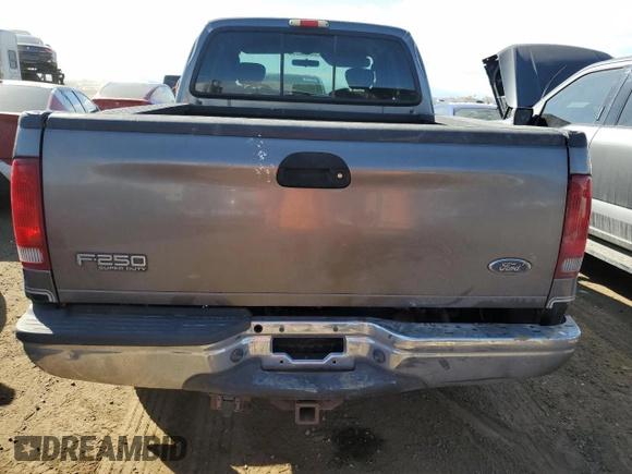 2003 Ford F-250 XL z VIN 1FTNX21PX3EB94715, wystawiony jako Copart lot #50712735 z przebiegiem 96 293 mil mil oraz Szkoda całkowita • Salvage title. Historia ofert i sprzedaży dostępna na DreamBid. Obrazek 6.