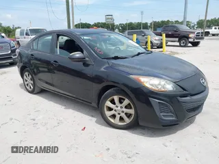 2011 Mazda Mazda3 i Touring with VIN JM1BL1VFXB1472772, listed as a IAAI auction lot 42180030 with 128,438 mi miles. Bid and sale history available at carsss.com. Image 1.