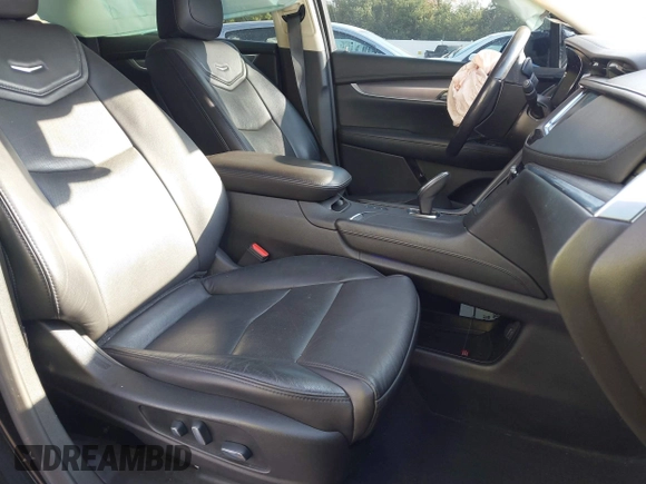 2018 Cadillac XT5 Luxury AWD with VIN 1GYKNDRS6JZ199827, listed as a IAAI auction lot 40699590 with 92,557 mi miles and . Bid and sale history available at DreamBid. Image 5.