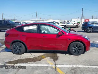 2024 Tesla Model Y Long Range with VIN 7SAYGDEE6RF190947, listed as a IAAI auction lot 41808973 with 2,457 mi miles. Bid and sale history available at carsss.com. Image 13.
