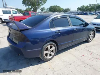 2008 Honda Civic Sdn EX with VIN 1HGFA15858L052702, listed as a IAAI auction lot 42031789 with 235,312 mi miles. Bid and sale history available at carsss.com. Image 4.