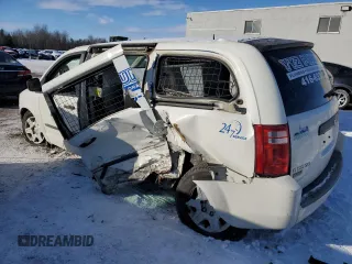 2009 Dodge Grand Caravan Cargo with VIN 2D4HN11E79R612545, listed as a Copart auction lot 88711085 with Not Provided miles and Salvage Title. Bid and sale history available at carsss.com. Image 2.