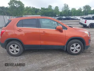 2016 Chevrolet Trax LT z VIN KL7CJPSB3GB522182, wystawiony jako IAAI lot #42392729 z przebiegiem 141 290 mil mil oraz . Historia ofert i sprzedaży dostępna na DreamBid. Obrazek 13.