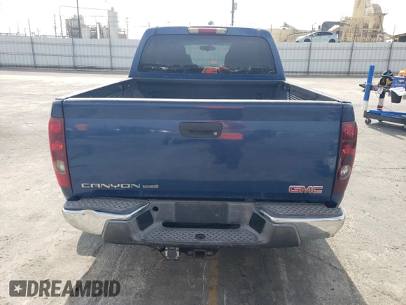 2005 GMC Canyon 1SE SLE Z71 with VIN 1GTDS136458179802, listed as a Copart auction lot 72376614 with 199,867 mi miles and Salvage Title. Bid and sale history available at carsss.com. Image 6.