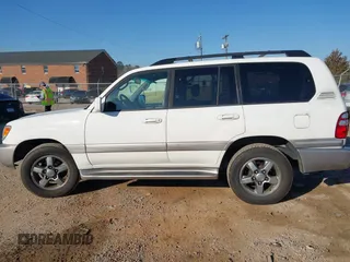 2005 Toyota Land Cruiser z VIN JTEHT05J952078683, wystawiony jako IAAI lot #41769150 z przebiegiem 299 737 mil mil oraz . Historia ofert i sprzedaży dostępna na DreamBid. Obrazek 14.