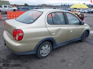 2001 Toyota ECHO with VIN JTDBT123610159121, listed as a IAAI auction lot 41766134 with 256,250 mi miles. Bid and sale history available at carsss.com. Image 4.