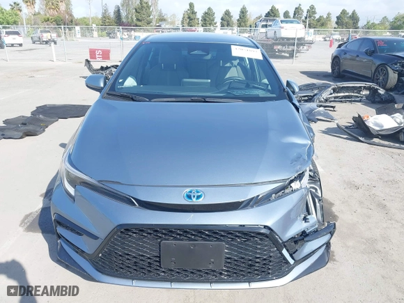 2024 Toyota Corolla Hybrid LE with VIN JTDBCMFE7RJ023311, listed as a IAAI auction lot 42051893 with 18,607 mi miles. Bid and sale history available at carsss.com. Image 12.