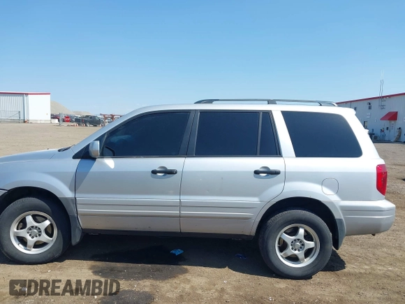2004 Honda Pilot EX with VIN 2HKYF18434H501925, listed as a IAAI auction lot 42115835 with 271,091 mi miles and . Bid and sale history available at DreamBid. Image 14.