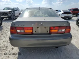 1998 Lexus ES 300 Luxury Sport Sdn with VIN JT8BF28G2W5046136, listed as a Copart auction lot 74364844 with 209,940 mi miles and Salvage Title. Bid and sale history available at carsss.com. Image 6.