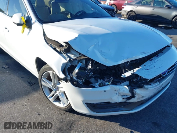 2015 Volvo S60 T5 Drive-E Premier Plus with VIN YV140MFC6F1314534, listed as a IAAI auction lot 41348374 with 81,235 mi miles. Bid and sale history available at carsss.com. Image 6.