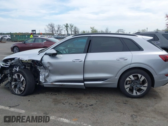 2022 Audi e-tron Premium with VIN WA1AAAGE3NB033122, listed as a IAAI auction lot 42081343 with 36,171 mi miles and . Bid and sale history available at DreamBid. Image 14.