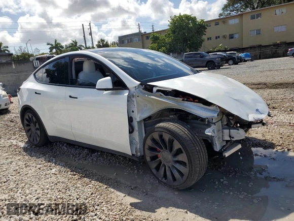 2023 Tesla Model Y Performance with VIN 7SAYGDEF0PF832570, listed as a Copart auction lot 51141415 with Not Provided miles and Non Repairable. Bid and sale history available at DreamBid. Image 4.