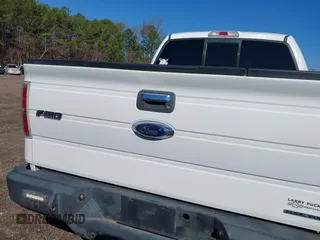 2014 Ford F-150 XL with VIN 1FTFW1EF9EFB42928, listed as a IAAI auction lot 41588979 with 154,192 mi miles. Bid and sale history available at carsss.com. Image 15.