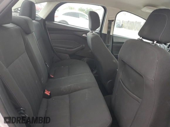 2018 Ford Focus SE with VIN 1FADP3F28JL256318, listed as a Copart auction lot 55524544 with 136,723 mi miles and Salvage title. Bid and sale history available at DreamBid. Image 11.