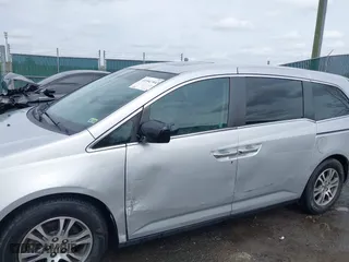 2011 Honda Odyssey EX-L with VIN 5FNRL5H69BB031983, listed as a IAAI auction lot 41947443 with 148,111 mi miles. Bid and sale history available at carsss.com. Image 6.