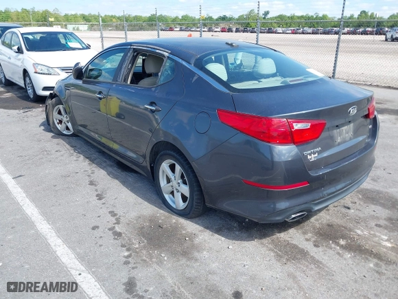 2015 Kia Optima LX with VIN KNAGM4A71F5634755, listed as a IAAI auction lot 42019729 with 101,064 mi miles. Bid and sale history available at carsss.com. Image 3.